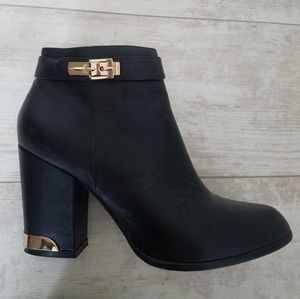 Black leather heeled booties